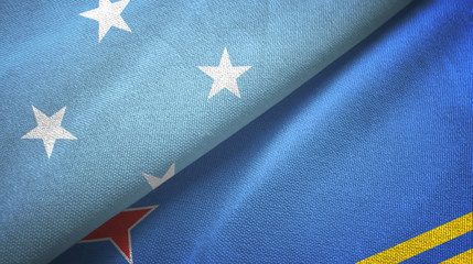 Micronesia and Aruba two flags textile cloth, fabric texture