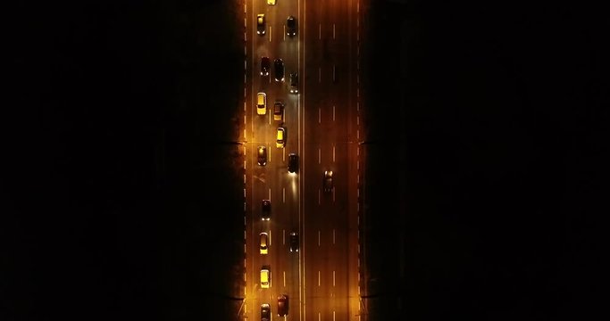 4K Aerial Top Drone View: Accident and traffic jam on the bridge in the evening after a working day. A huge number of cars on the road at rush hour. Downtown, city central part. Dnipro, Ukraine