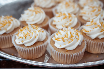 Cupcakes with gold sprinkles