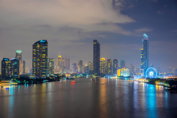 Fototapeta na wymiar Modern building in Bangkok city at night