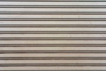 Obraz premium Pattern of Rolling shutters door for background