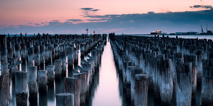 Iconic post stumps stand pround at the end of princess pier in meblurne australia