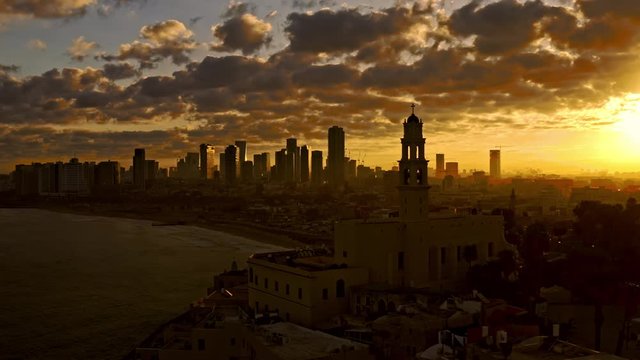 Old city Jaffa and Tel Aviv in Israel, morning sunrise 4k aerial drone skyline