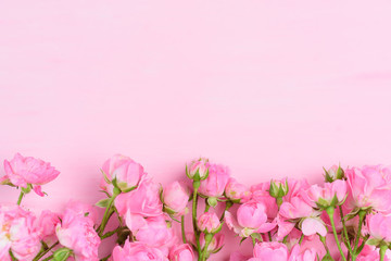 Naklejka na ściany i meble Pink roses bouquet on pink background