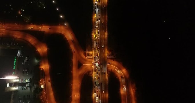 4K Aerial Top Drone View: Accident and traffic jam on the bridge in the evening after a working day. A huge number of cars on the road at rush hour. Downtown, city central part. Dnipro, Ukraine
