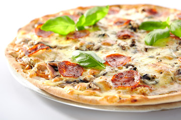 Traditional Italian Pepperoni Pizza with Mushrooms and Salami Isolated