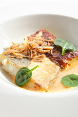 Baked Halibut, Pollock or Cod Fillet with Parsnip Cream Isolated