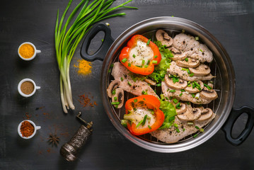 healthy food steamed chicken with mushrooms and vegetables 