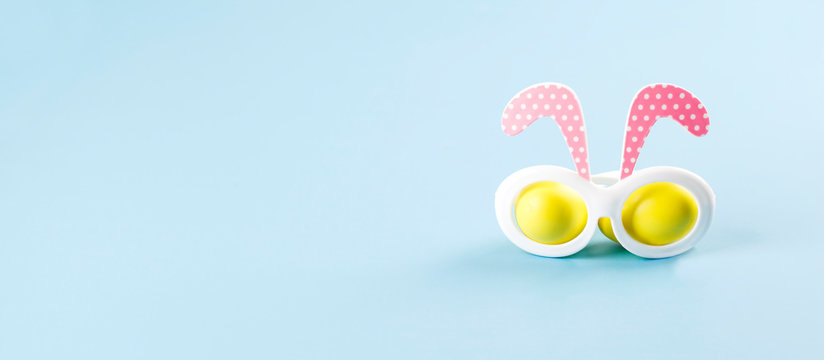 Easter banner with Easter bunny. Easter bunny glasses. Easter concept.