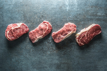 Beef Rib Eye steak on slate board - Top of view