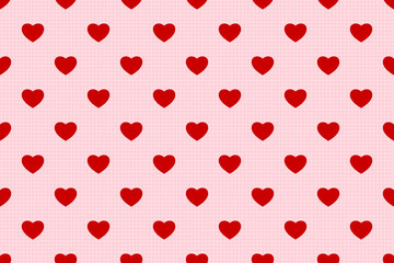 Seamless pattern image of red hearts on pink background.
