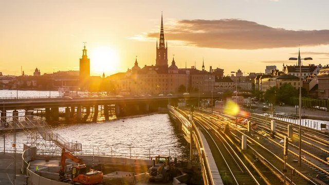 Sunset in Stockholm, Sweden. Time lapse video. Stockholm city skyline with Centralbron seen from Sodermalm district.
