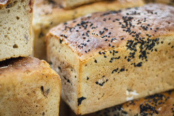 Fresh loaves of rye or wheat bread
