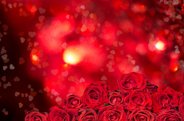 Obraz na płótnie Canvas Bouquet of red roses on Glowing Hearts. Heart Shape Bokeh. Birthday. Valentine's day. March 8. Mother's day. Greeting card. Wallpaper. Banner.