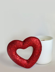 heart with a white candle on a white background. postcard for Valentine's Day
