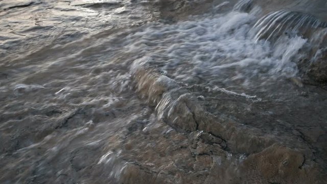 Water flowing into the limestone travertines of Pamukkale