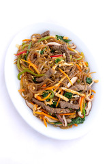Stir fried Korean glass noodle with soy sauce called Japchae
