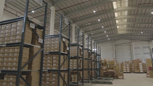 Wide Tilt Down Shot Of A Big Storage Warehouse