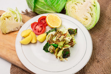 stir-fried cabbage with fish sauce in the plate