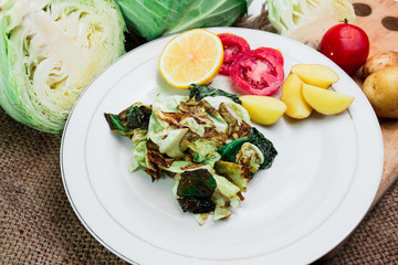 stir-fried cabbage with fish sauce in the plate