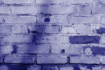 Old brick wall texture close up. Abstract background blue color toned