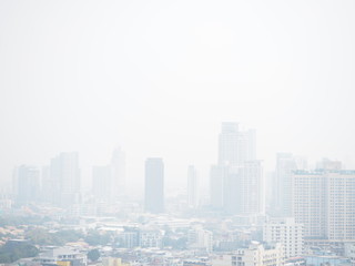 Fototapeta na wymiar Cityscape of Bangkok covered by mixture of dust in air pollution, situation of air pollution 2.5 pm in Bangkok, Air pollution in big city, it is unhealthy.