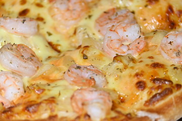 italian pizza cheese with pineapple and shrimp topping sea food