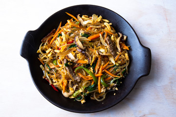 Stir fried Korean glass noodle with soy sauce called Japchae