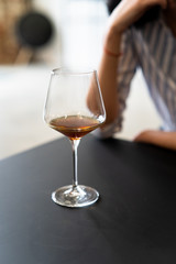 glass of wine on table in restaurant