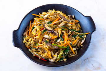 Stir fried Korean glass noodle with soy sauce called Japchae