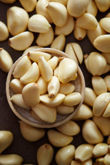 Peeled garlic background, studio shot 