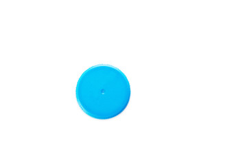 Blue plastic bottle cover on white background, top view