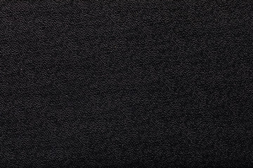 black artificial leather texture background. macro photo