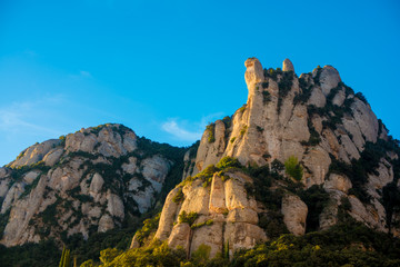 BARCELONA, SPAIN - December 26, 2018: The mountains of Montserrat in Barcelona, Spain. Montserrat  is a Spanish shaped mountain which influenced Antoni Gaudi to make his art works.