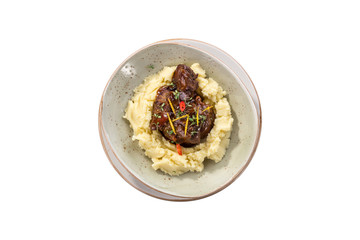 Plate of Goulash Stroganoff isolated on white background with mashed potato