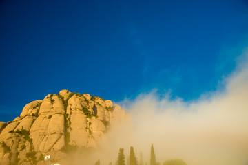 BARCELONA, SPAIN - December 26, 2018: The mountains of Montserrat in Barcelona, Spain. Montserrat  is a Spanish shaped mountain which influenced Antoni Gaudi to make his art works.