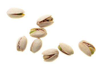 Ripe pistachios nuts isolated on a white background