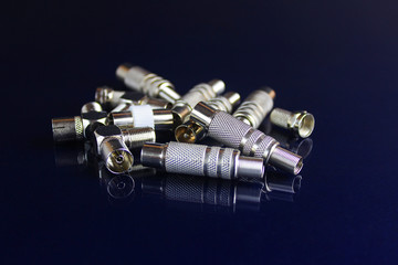 Plug on a dark background. Telecommunications connectors for building a telecommunications network....