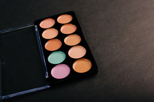 Palette of correctors for the face. Skin cream. concealer for makeup. Professional makeup. Makeup artist tool