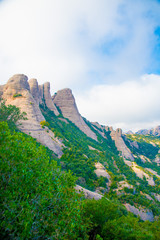 BARCELONA, SPAIN - December 26, 2018: The mountains of Montserrat in Barcelona, Spain. Montserrat  is a Spanish shaped mountain which influenced Antoni Gaudi to make his art works.