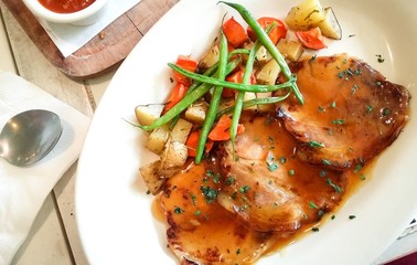 Pork loin in red sauce