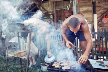 Barbecue making outdoors on a regular / vintage grill.