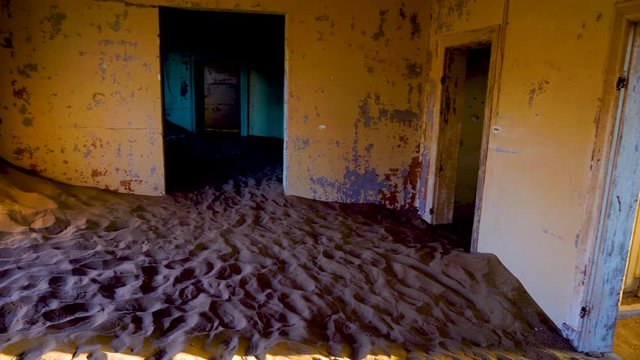 Panning in the interior of an abandoned house in Kolmanskop ghost town in Namibia, Africa.