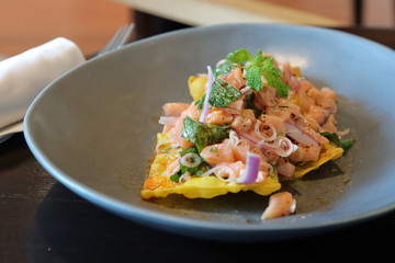 salmon salad on fried dough