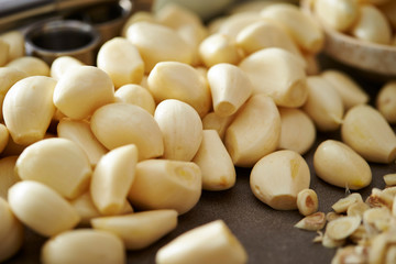 Peeled garlic background, studio shot 
