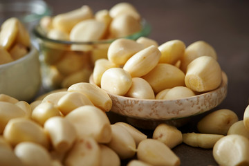 Peeled garlic background, studio shot 