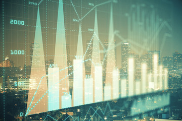 Financial graph on night city scape with tall buildings background multi exposure. Analysis concept.