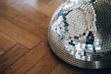 disco ball and wooden floor