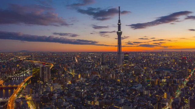 Aerial view Hyper lapse 4k Video of Tokyo   city on sunrise at Tokyo, Japan. (Blur text and Logo.)