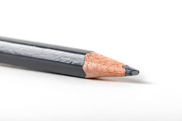 close up macro shot of colorful pencils on white background